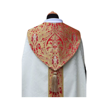 Cope made in lightweight damask adorned with a coronation style brocade with Tassel. Made in Poland and sold by The Clergy Store