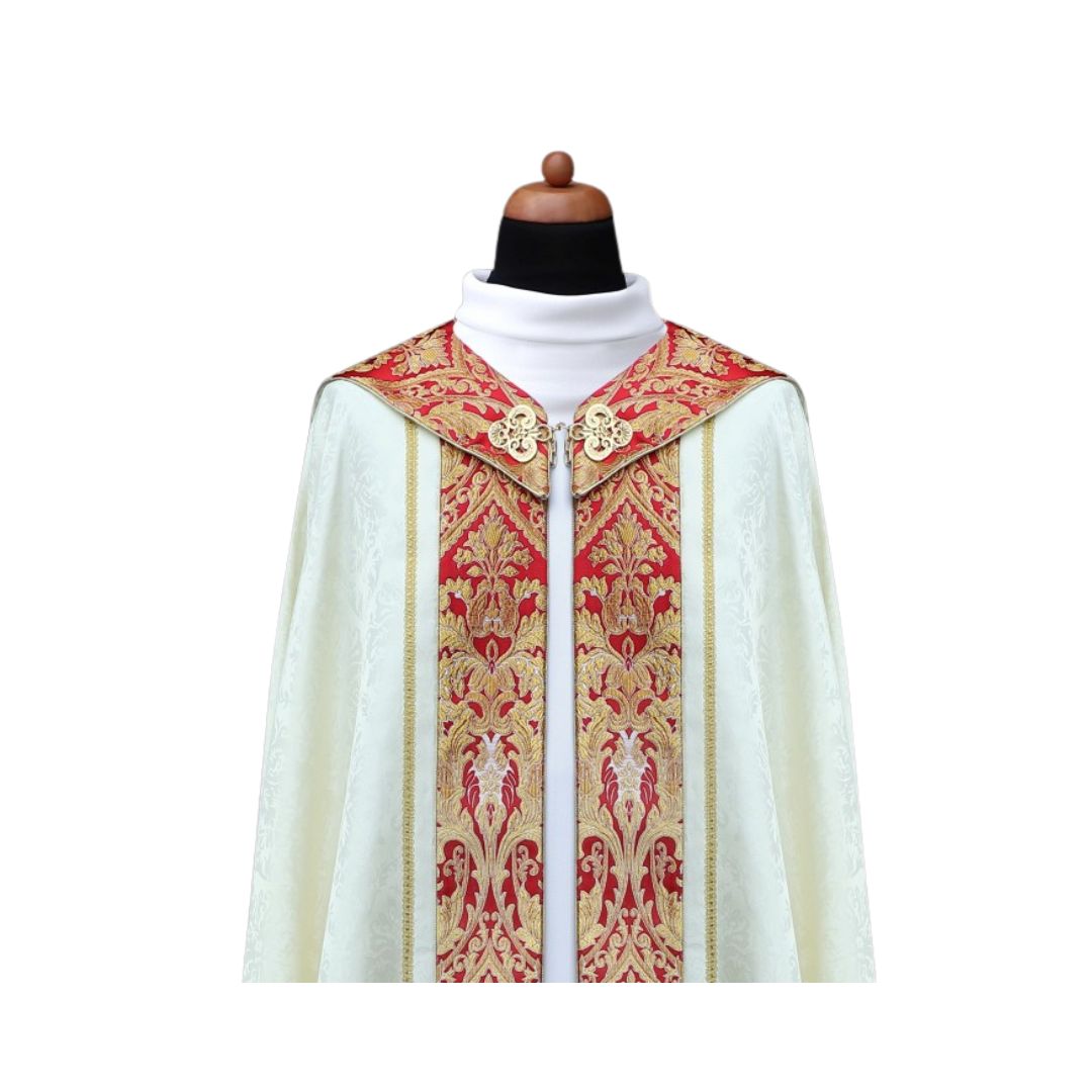 Cope made in lightweight damask adorned with a coronation style brocade with Tassel. Made in Poland and sold by The Clergy Store