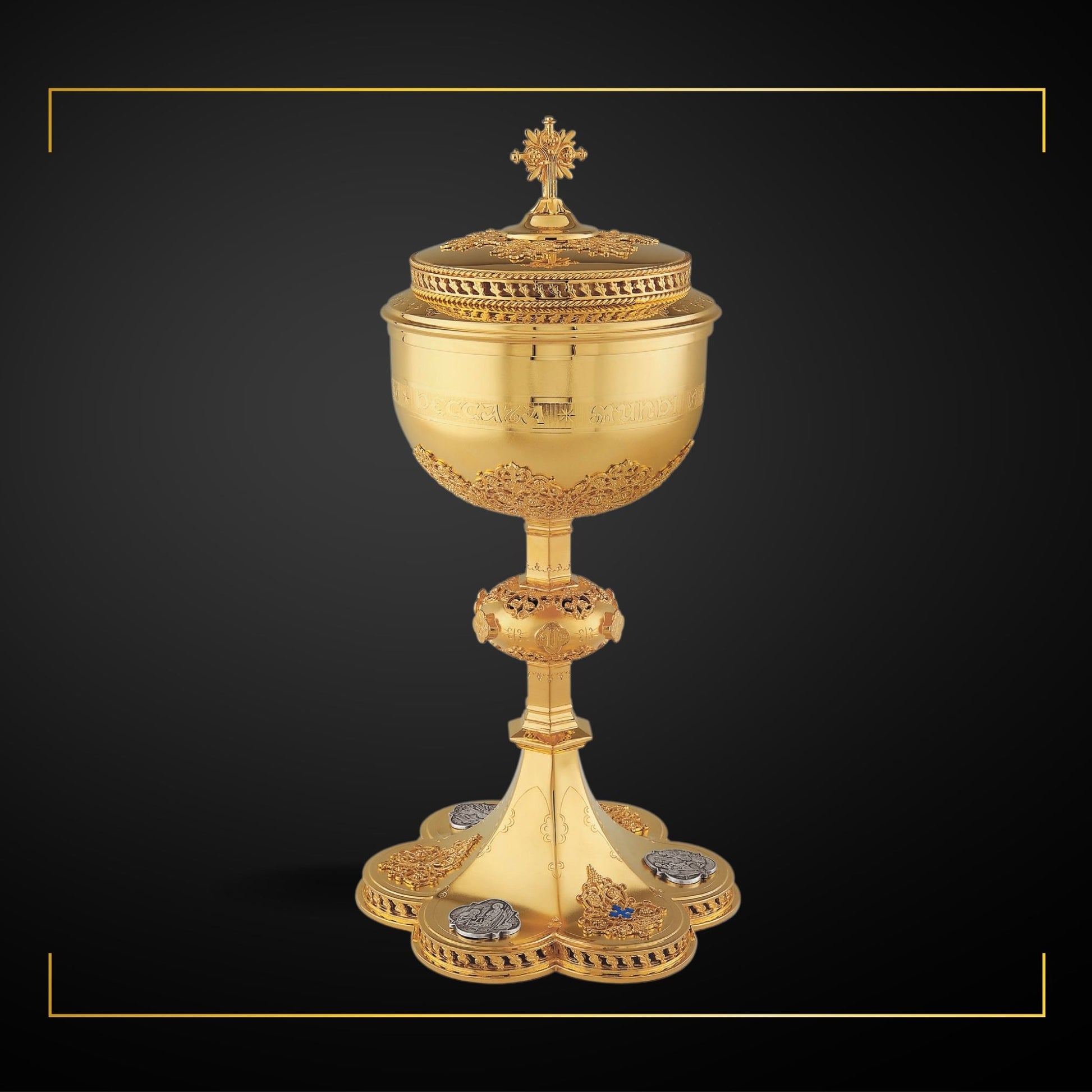 Ciborium neo-gothic style with medallions depicting the Life of Christ and cup inscription: “ECCE AGNUS DEI QUI TOLLIT PECCATA MUNDI” , 12 1/4” Ht. , 250 Hosts Sold by The Clergy Store