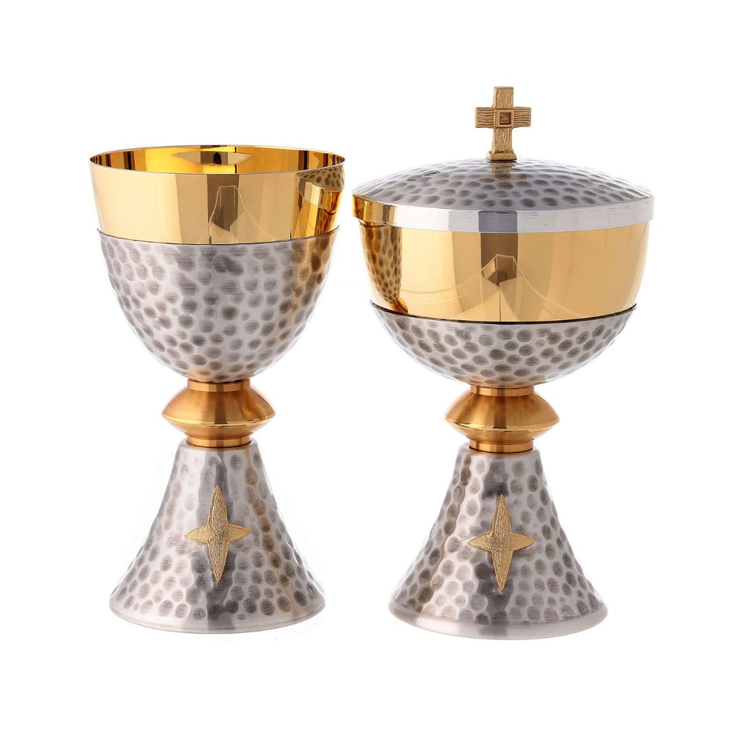 Chalice and Ciborium in Silver or Gold hammered finish with cross emblem. 24K Gold plated cup. Made in Italy