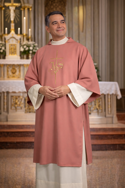 Deacon in a rose liturgical vestment standing in a church setting.