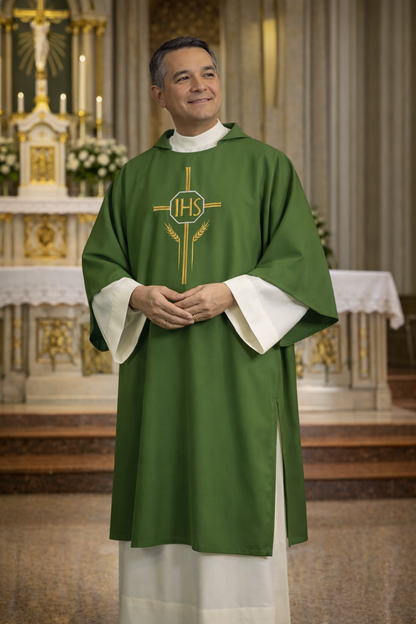 Deacon in a green dalmatic with an 'IHS' symbol in a church setting