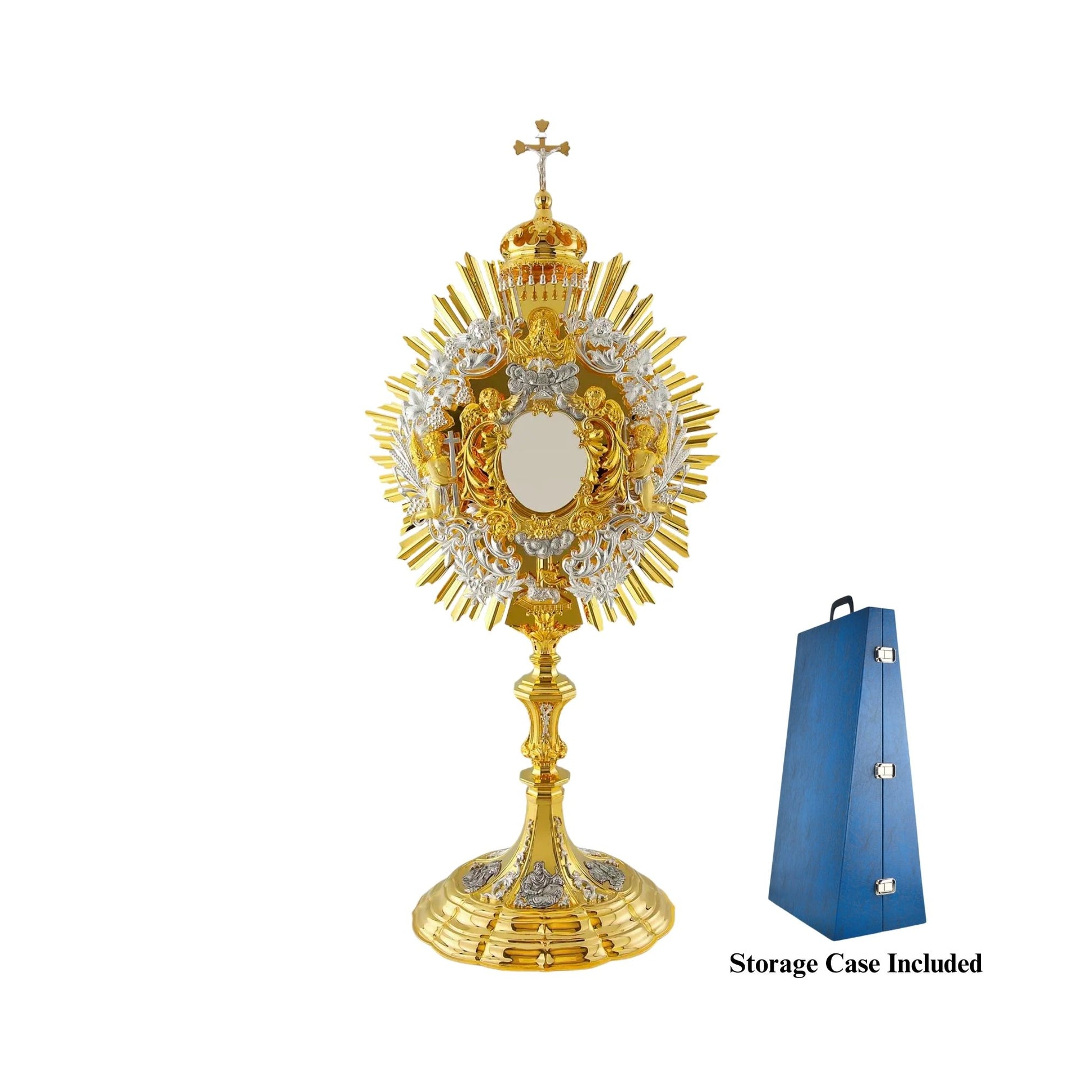 Baroque brass monstrance, gold-plated with silver-plated detailing. The central part consists of a sunburst and a silver-plated wreath of wheat and grapevine. At the top of the opening for the luna there is an image of God the Father and the Dove (the Holy Spirit). The Lamb of God is attached to the bottom of the glory. Several angel figures surround the luna case. The monstrance is topped with a canopy and a crucifix with a silver-plated figure of Jesus. The base is embellished with silver-plated and oxidi