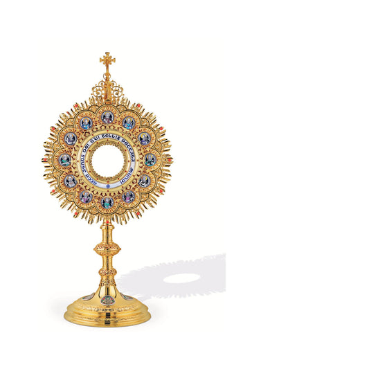 Traditional Monstrance with Medallions of the Twelve Apostles and Latin inscription: "ECCE AGNUS DEI QUI TOLLIT PECCATA MUNDI" Medallions with scenes from the Bible on the base. Made in Poland and sold by The Clergy Store