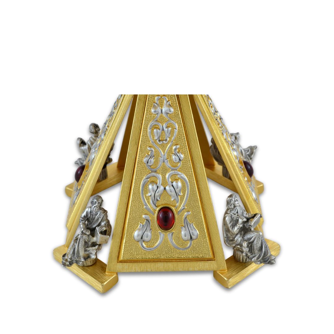 Thabor for monstrance gold finish with evangelist, lilies and precious stones. Made in Italy and sold by The Clergy Store