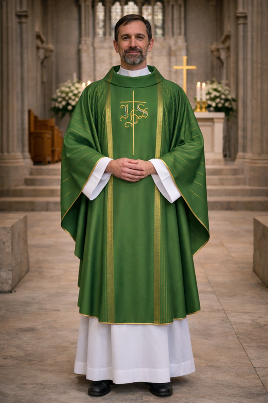 Priest in green liturgical vestment with white stole standing in a church.