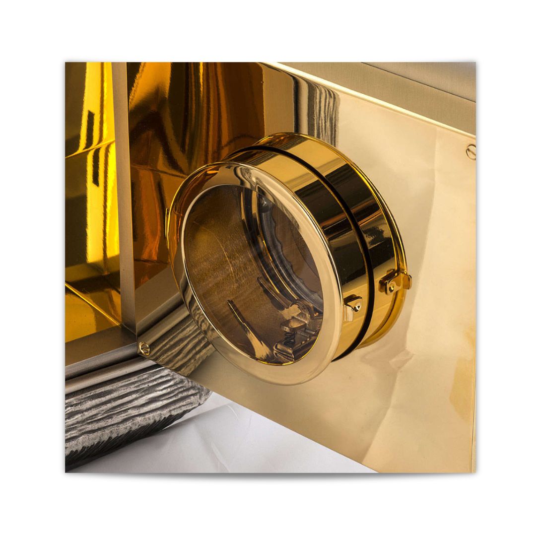 Bronze wall tabernacle IHS with a silver finish and red stones and adoration window. Made in Italy and sold by The Clergy Store