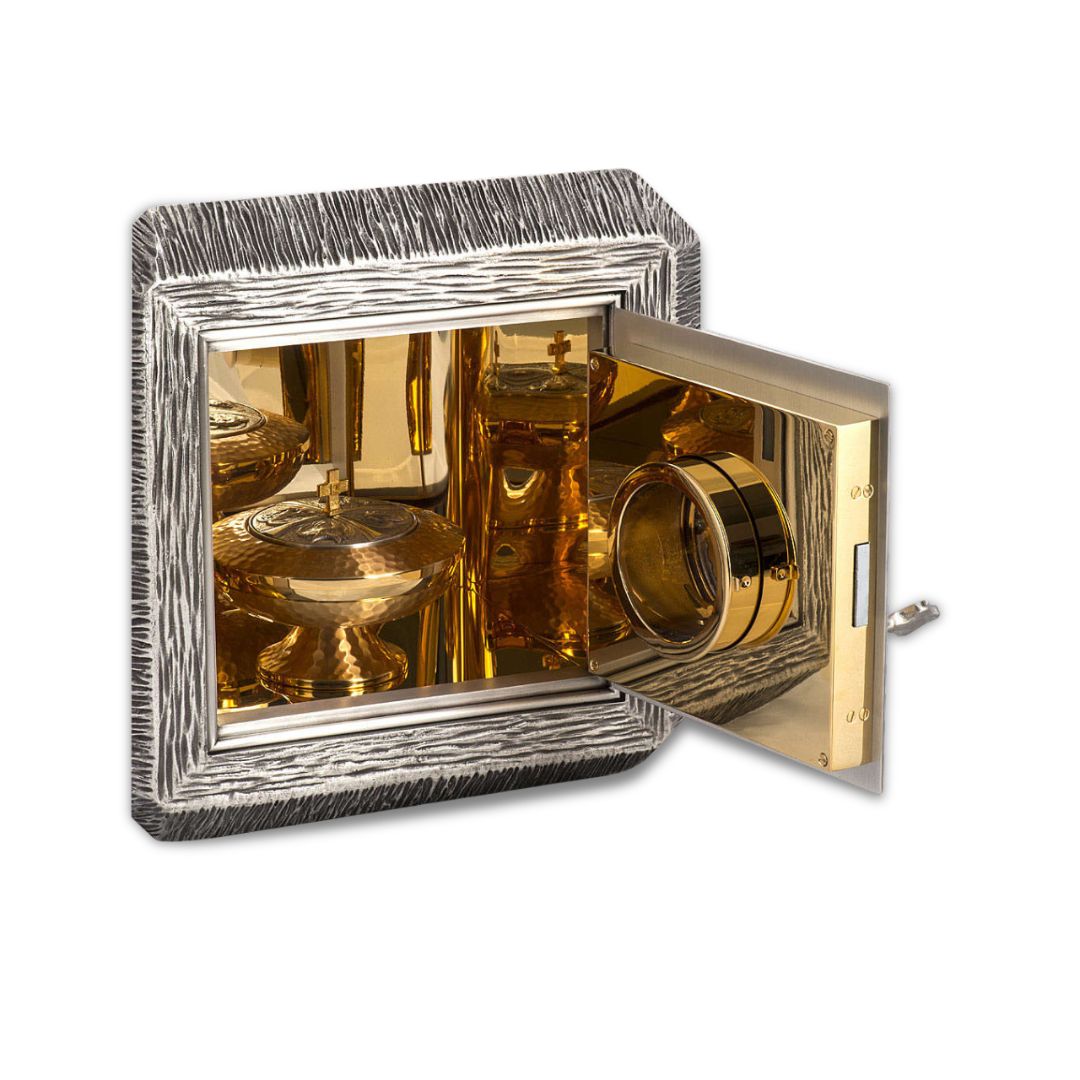 Bronze wall tabernacle IHS with a silver finish and red stones and adoration window. Made in Italy and sold by The Clergy Store