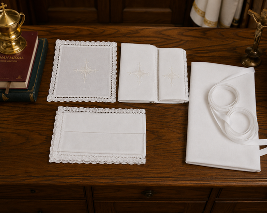 Set of five Italian-made altar linens including a purificator, chalice pall, corporal, manuterge, and amice, laid flat on a white surface.