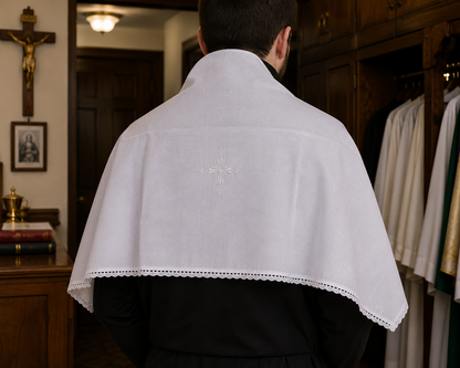 Rectangular Italian cotton amice with attached cloth ties for securing beneath an alb back vew