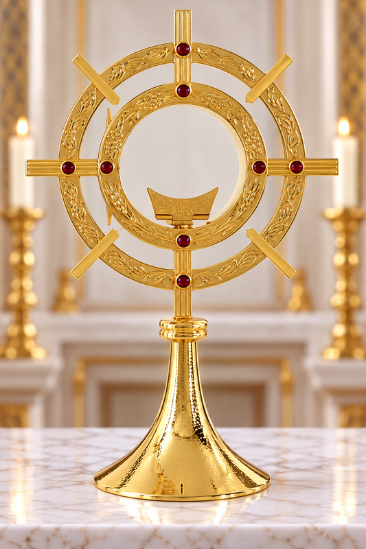 Small contemporary monstrance with red stones and engraved starburst