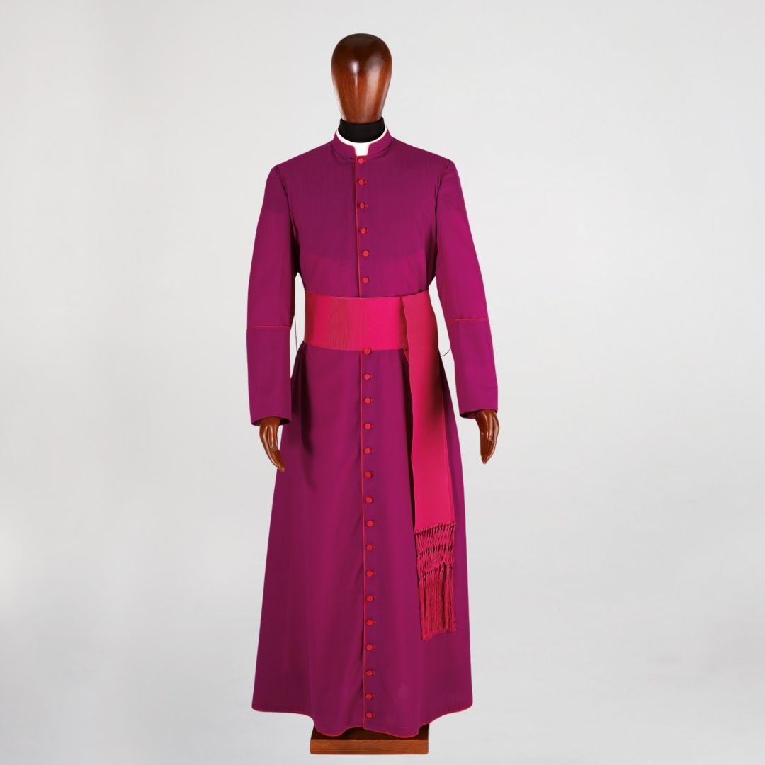 Roman clerical cassock in roman purple with piping and buttons. Made in Italy and sold by The Clergy Store