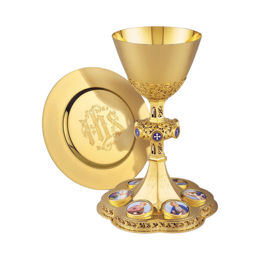 Chalice & Dish Paten in neo-gothic style with medallions of the Four 
Evangelists, the Mother of  God and the Crucifixion,  9 1/4” Ht. Sold by The Clergy Store