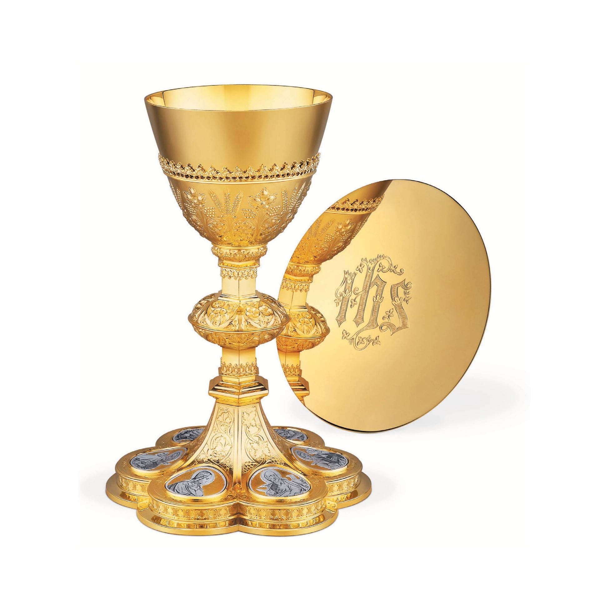 Chalice & Scale Paten in neo-gothic style with medallions of Jesus 
Christ, Mary and the Four Evangelists,  9 1/4” Ht. sold by The Clergy Store