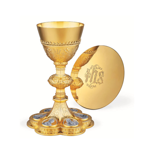 Chalice & Scale Paten in neo-gothic style with medallions of Jesus 
Christ, Mary and the Four Evangelists,  9 1/4” Ht. sold by The Clergy Store