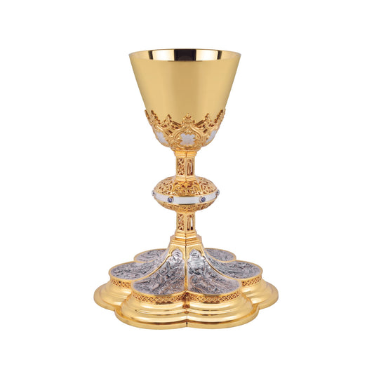 Chalice & Scale Paten in neo-gothic style with scenes from the New 
Testament ,  9” Ht.  sold by The Clergy Store