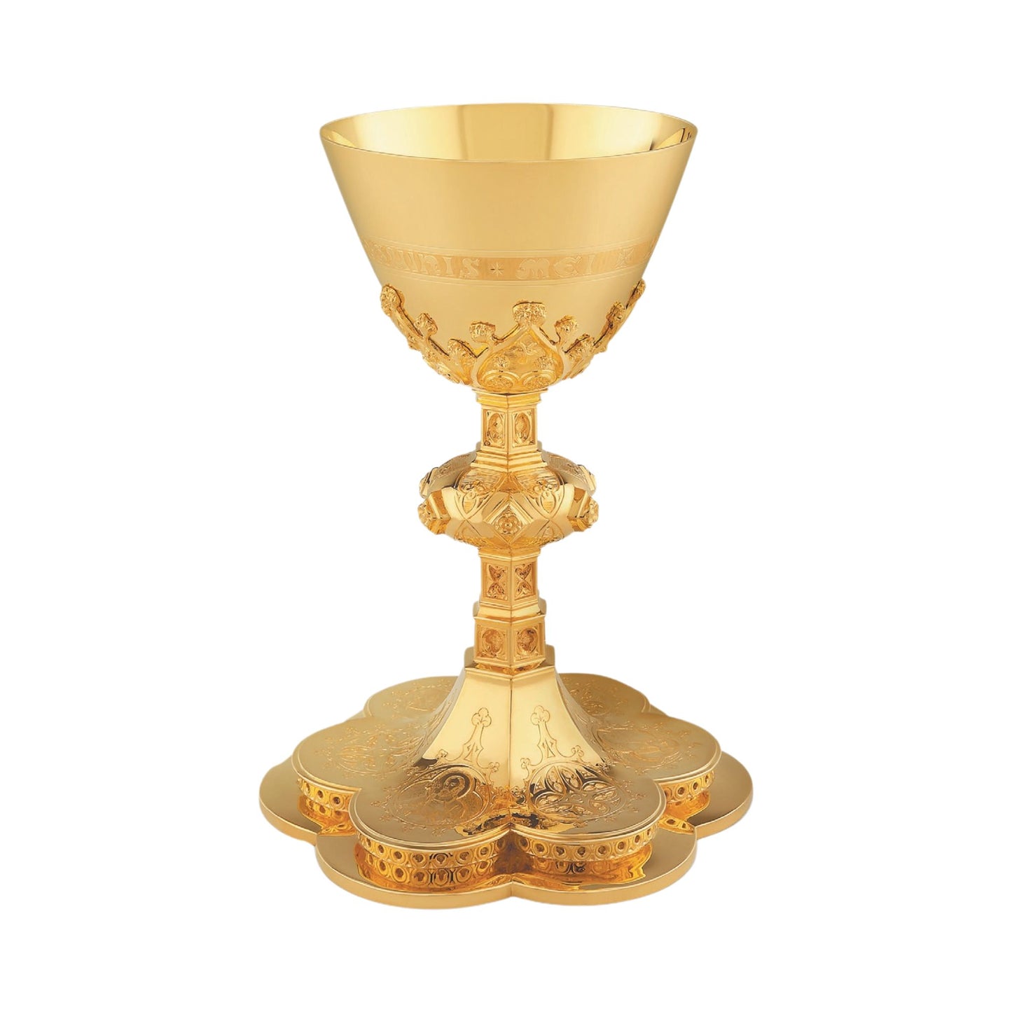 Chalice & Scale Paten in neo-gothic style with engraved images of the Holy Family and cup inscription: “HIC EST ENIM CALIX SANGUINIS 
MEI” , 8 3/4” Ht.  Sold by The Clergy Store