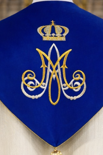 Liturgical Marian cope  with embroidered Lilly's on velvet and cope clasp.