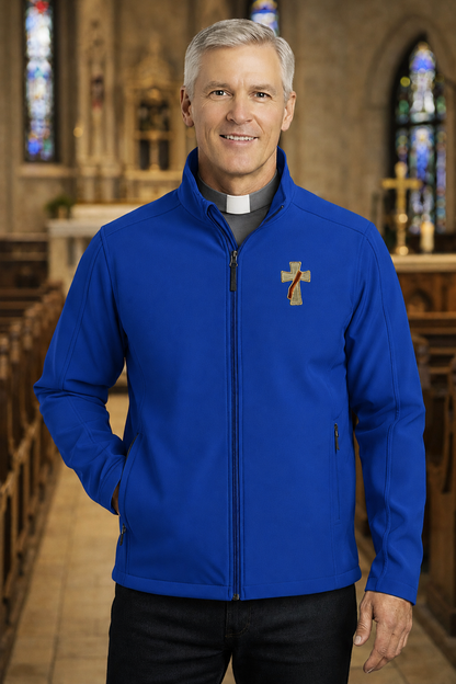 Man wearing a royal blue deacon jacket with a logo in a church setting