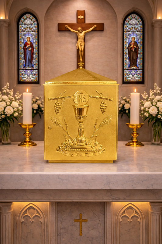 Single door tabernacle with chiseled image of a chalice, grapes, and ears of wheat with a gold finish. Made in Italy and sold by The Clergy Store