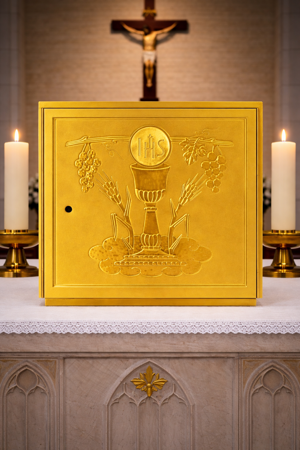 Single door tabernacle with chiseled image of a chalice, grapes, and ears of wheat sourrounded by a wood casing. Made in Italy and sold by The Clergy Store