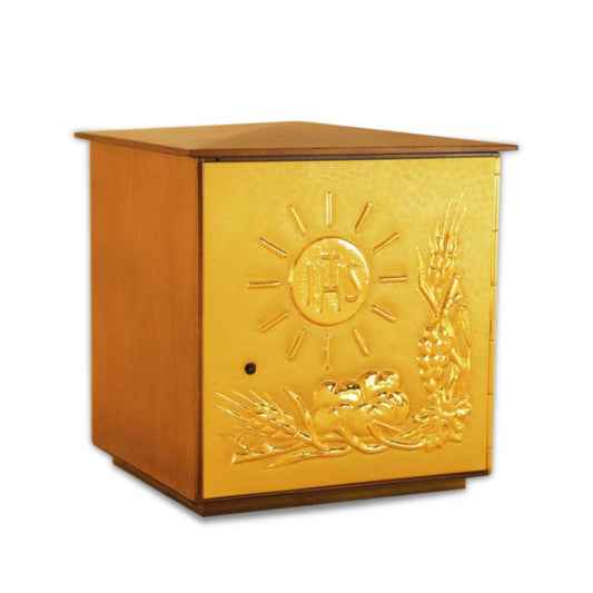 Single door tabernacle with chiseled image of a chalice, grapes, and ears of wheat sourrounded by a wood casing. Made in Italy and sold by The Clergy Store