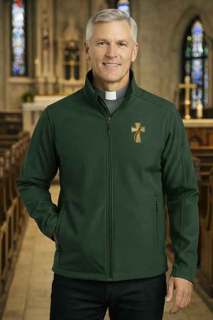 Man wearing a green deacon jacket with a logo in a church setting
