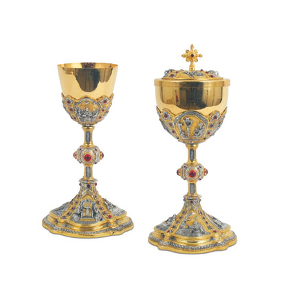 Chalice and Ciborium bi-color gold plated with biblical motives and stones.